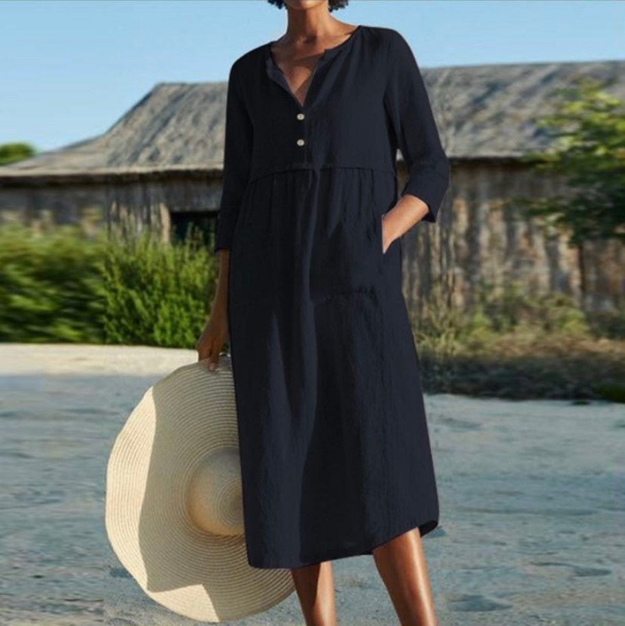 Black button-front summer dress with V-neck and three-quarter sleeves