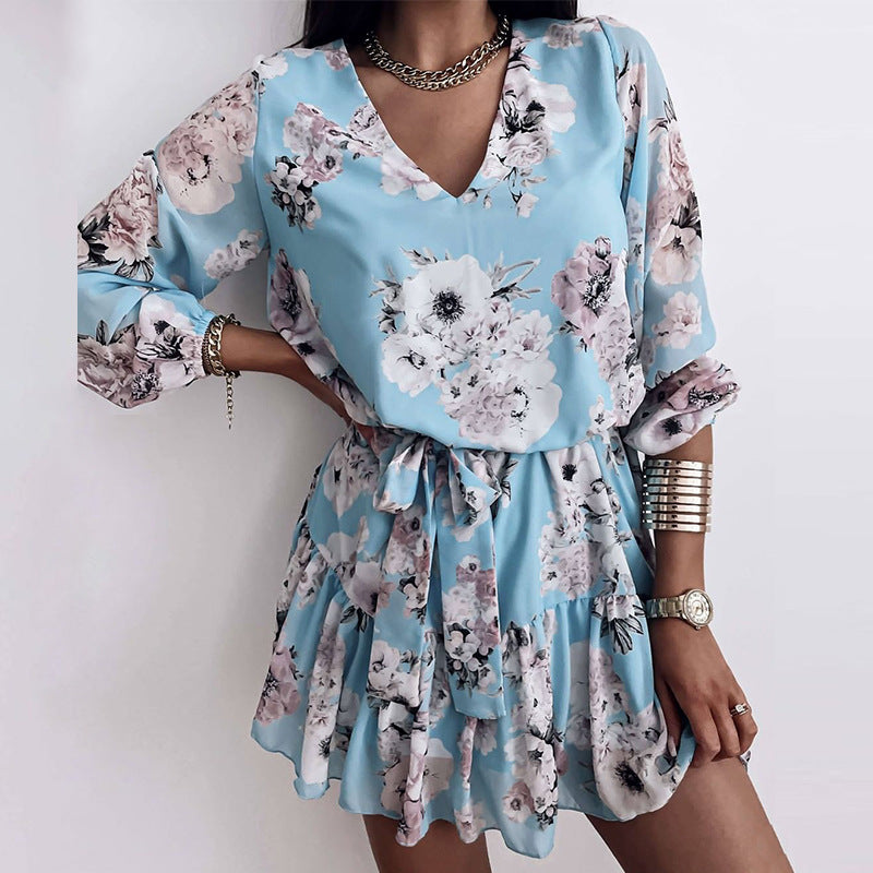 Floral mini dress in light blue with pink and gray flowers, V-neck, gathered waist