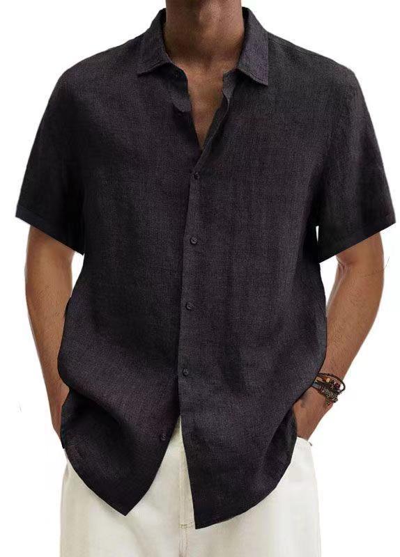 Black short-sleeve button-up shirt with point collar and button front