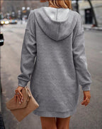 Gray hoodie dress from back with textured diamond pattern and drawstring hood