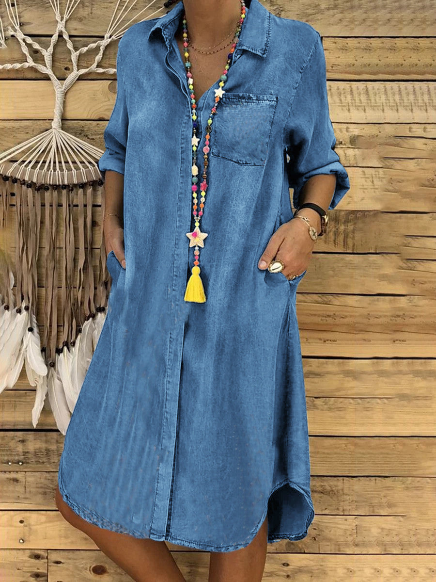 Medium blue denim shirt dress with chest pocket, button front, tassel pendant