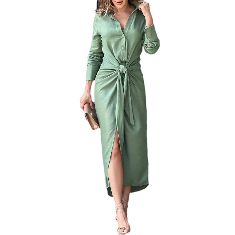 Green midi shirt dress with button front, long sleeves, and tied waist