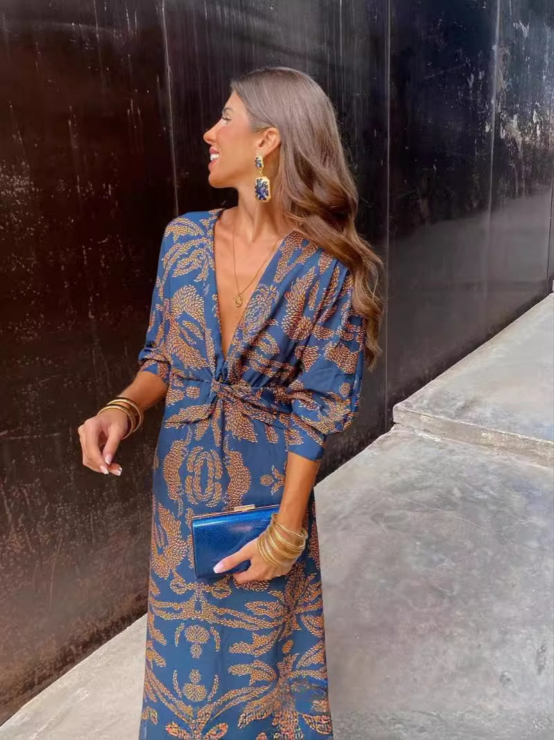 Blue patterned summer maxi dress with V-neck wrap and waist tie, long sleeves