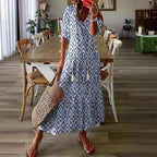 Blue boho maxi dress with short sleeves and ikat-style diamond pattern