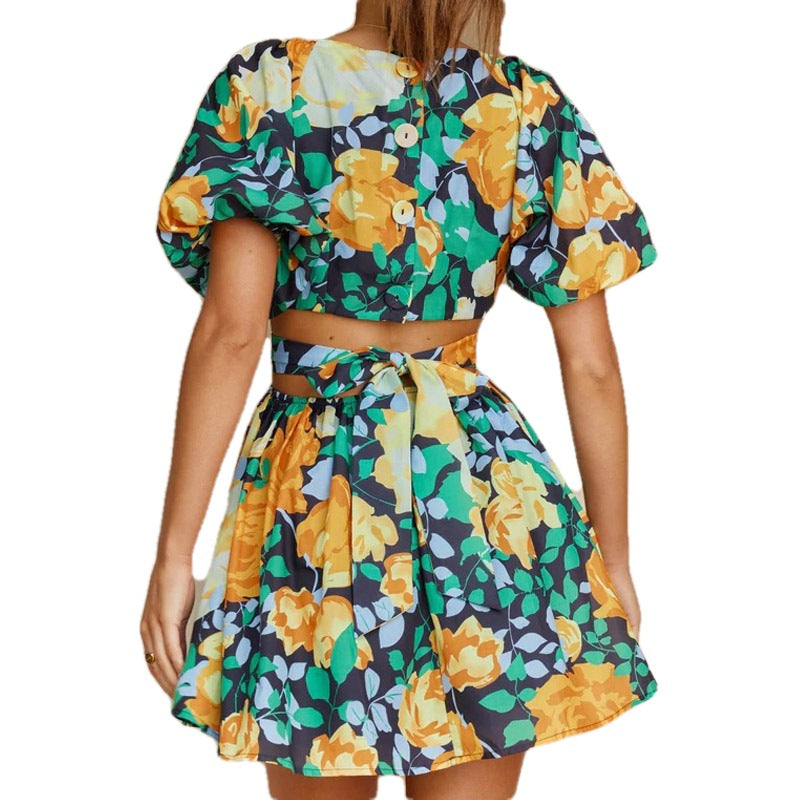 Floral casual summer dress with puff sleeves, tie waist, and short gathered skirt
