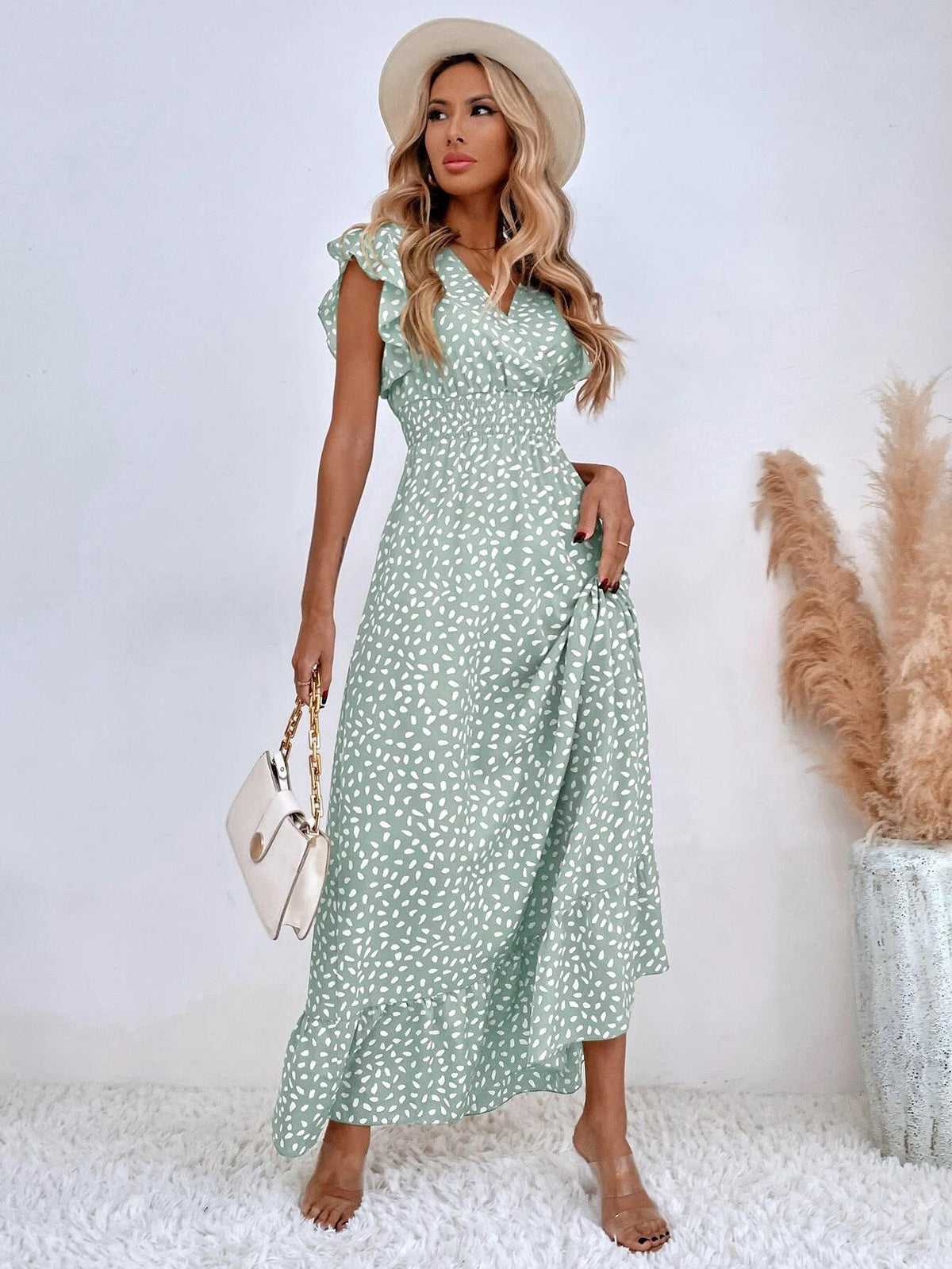 Relaxed mint green patterned maxi dress with short puff sleeves