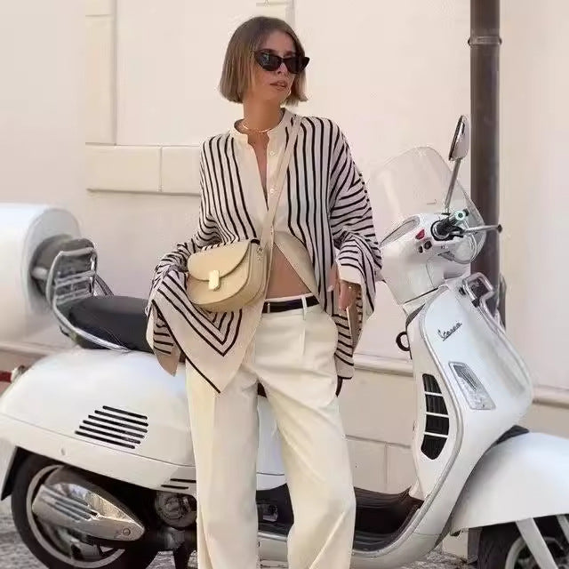 Clara™ elegant blouse, black-and-white striped V-neck with long sleeves and buttons