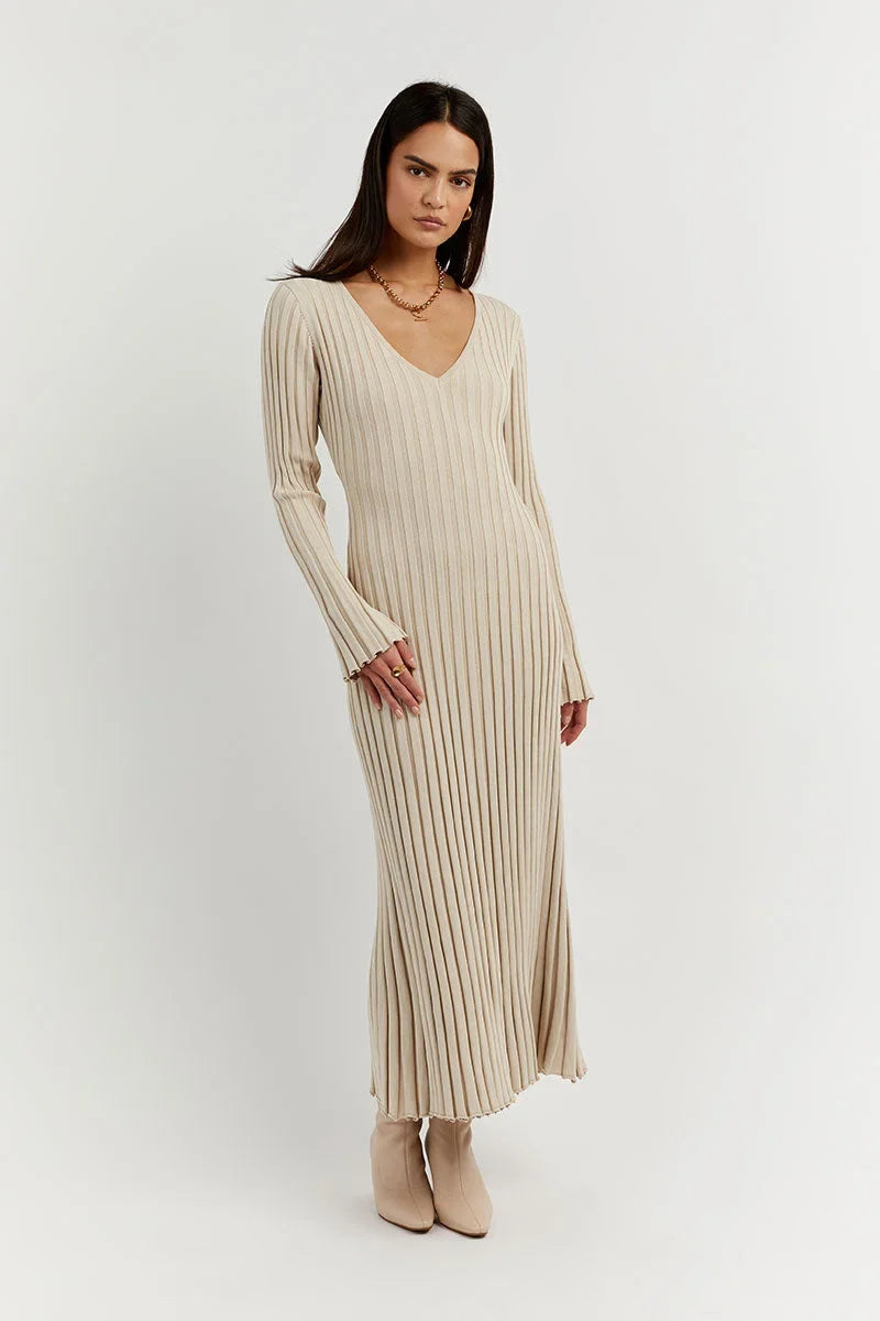 Beige V-neck midi dress with long sleeves, vertical stripes, and side slit