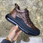 Brown lizard-pattern lace-up high-top sneakers on thick black sole, textured leather upper