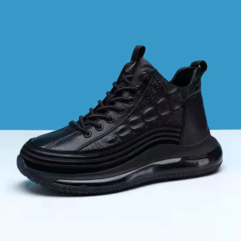 Black ankle sneakers with lace-up closure and quilted-look paneling