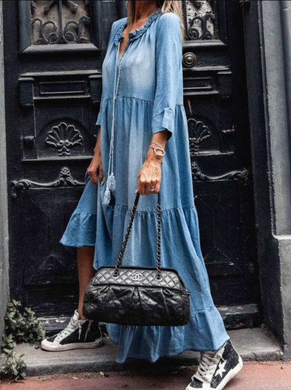 Light blue tiered maxi dress with V-neck, front buttons, relaxed fit and long tiered skirt