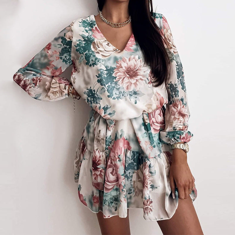 Floral mini dress in white with green and pink blooms, long sleeves, V-neck