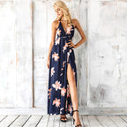 Navy floral halter maxi dress with cinched waist and side slit