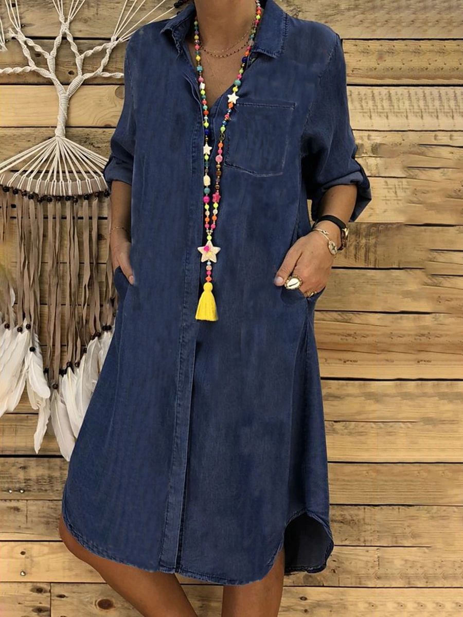 Dark blue denim shirt dress with front buttons, chest pocket, side-slit hem