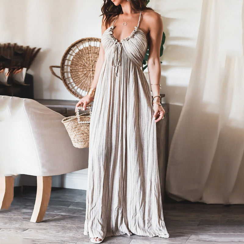 White striped maxi dress with ruffled neckline and spaghetti straps
