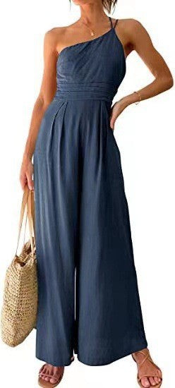 Dark blue halter-neck wide-leg jumpsuit with smocked bodice and elastic waist