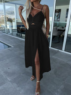 Black sleeveless midi dress with V-neck, front waist cutout, and side slit
