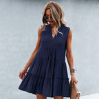Navy blue sleeveless tiered mini dress with V-neck button front