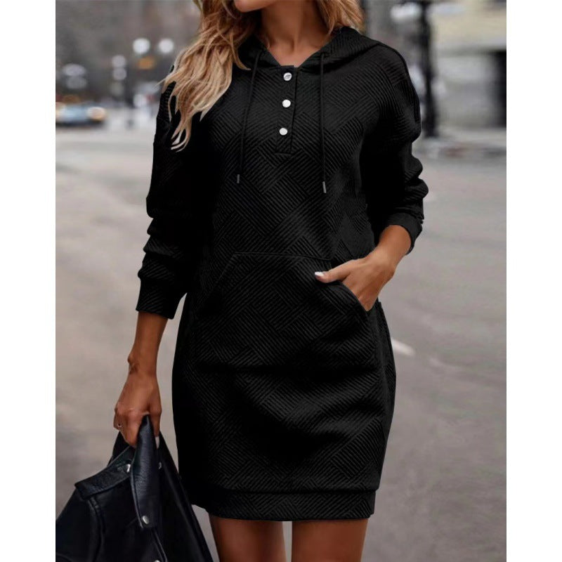 Hoodie dress in black with diamond pattern, front button placket, and kangaroo pocket