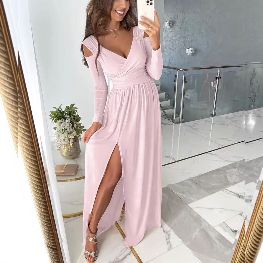 Pink V-neck maxi dress with long sleeves, ruched waist and thigh-high slit