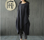 Dark black oversized spring dress with long sleeves, round neck, asymmetrical draped hem