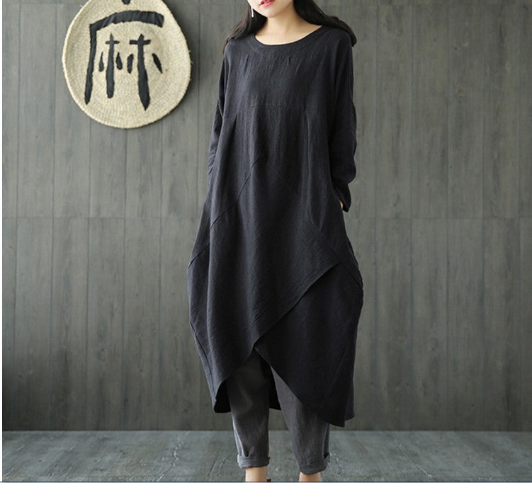Dark black oversized spring dress with long sleeves, round neck, asymmetrical draped hem
