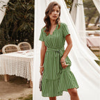 Green striped midi dress with V-neck, short sleeves, and waist tie