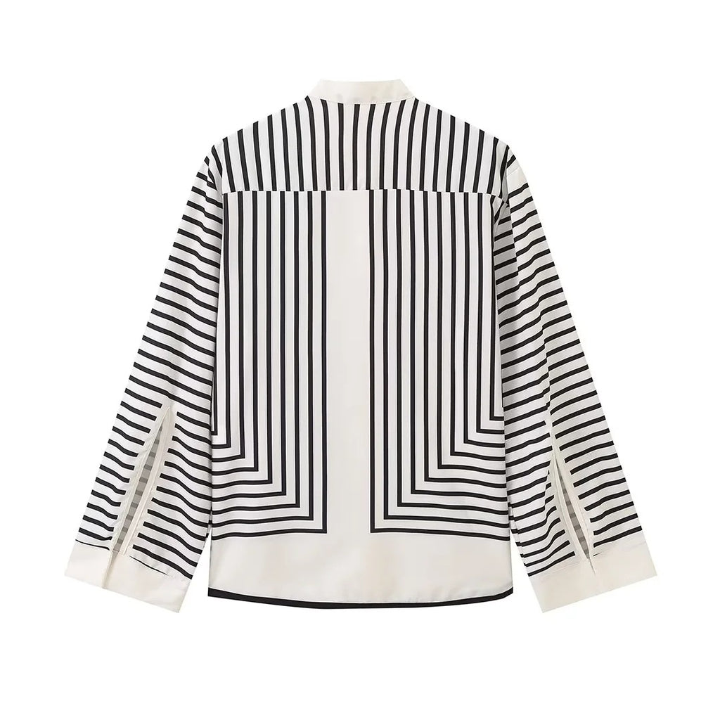 Clara™ elegant blouse, back view with vertical stripe panel and curved hem