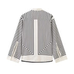 Clara™ elegant blouse, back view with vertical stripe panel and curved hem