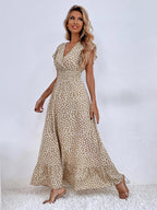 Relaxed beige patterned maxi dress with short flutter sleeves