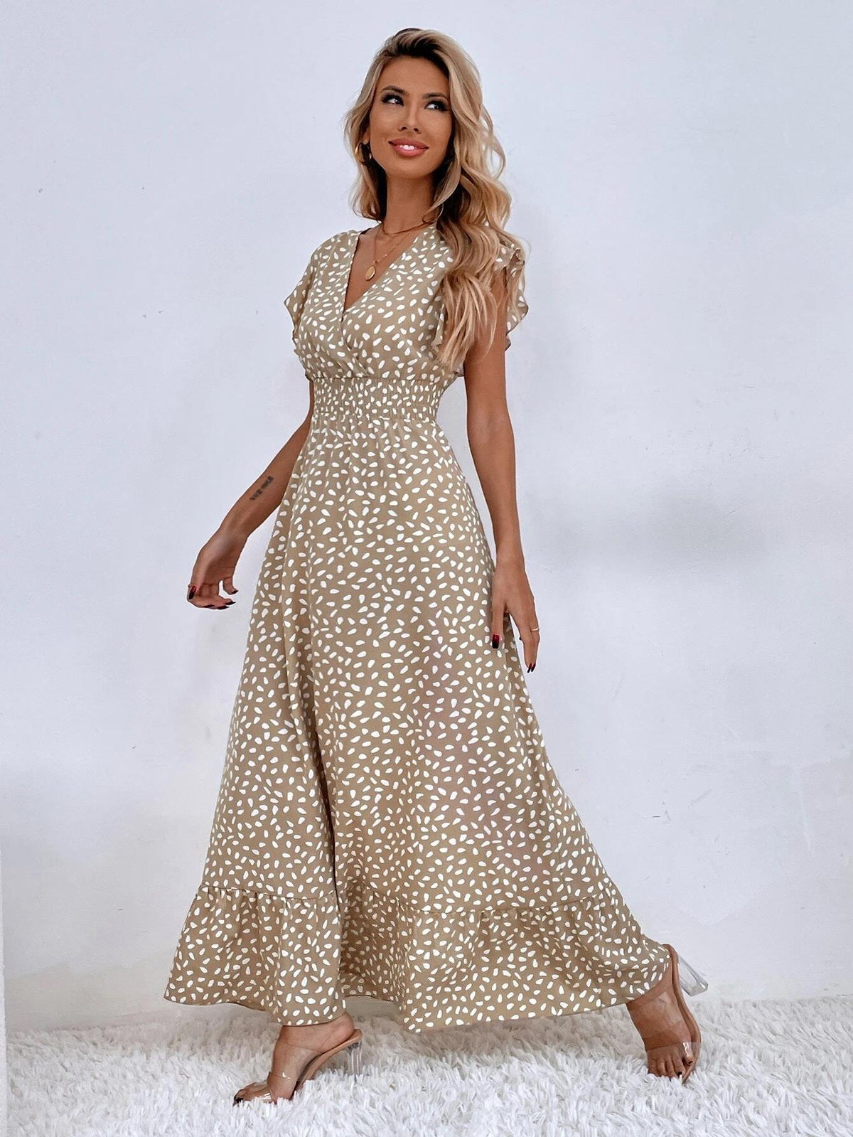 Relaxed beige patterned maxi dress with short flutter sleeves