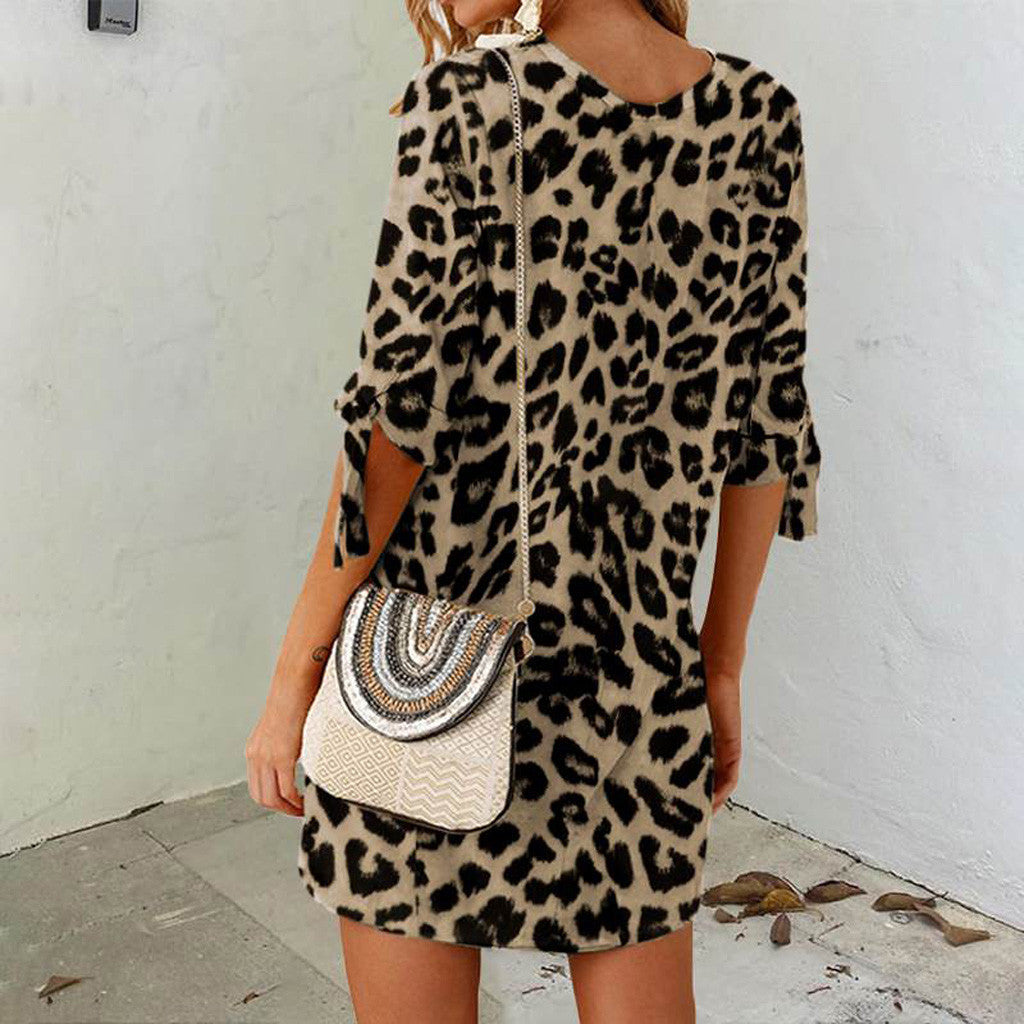 Leopard-print mini dress with round neck and tied three-quarter sleeves
