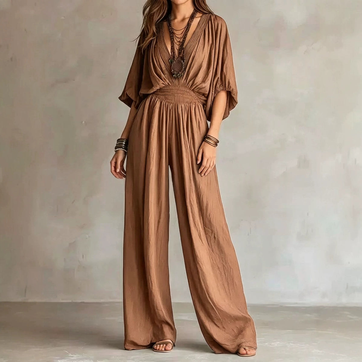 Camel brown V-neck wide-leg jumpsuit with elastic waist and draped short sleeves