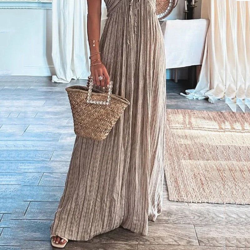 Taupe striped maxi dress with spaghetti straps and tassel neckline detail