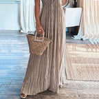 Taupe striped maxi dress with spaghetti straps and tassel neckline detail