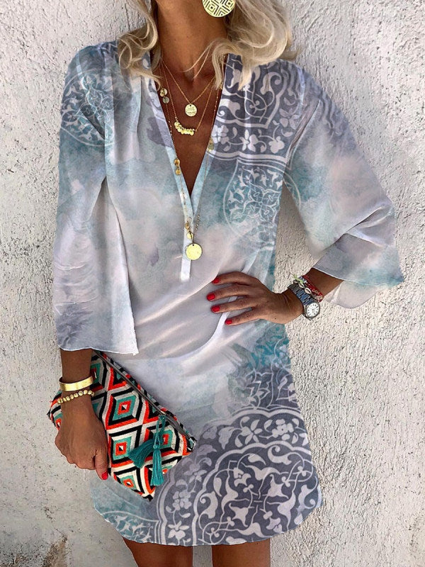 Blue printed mini dress with V-neck and long sleeves, button-front