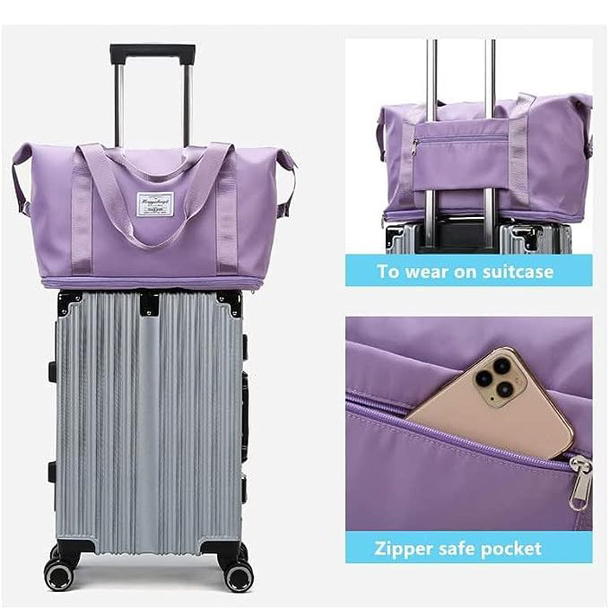 Purple waterproof sleeping bag carrier, suitcase-style handles, zip pocket detail
