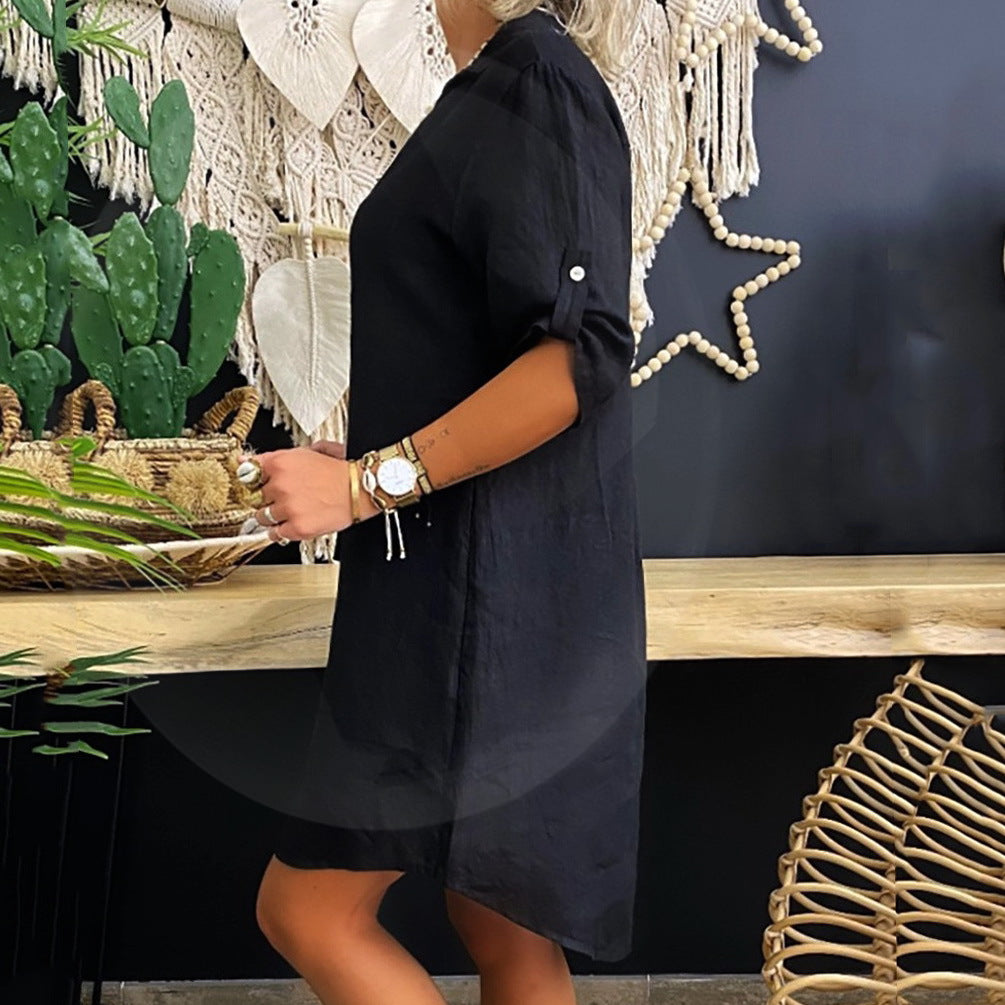 Black cotton blouse dress, side view with collar and elbow-length sleeves