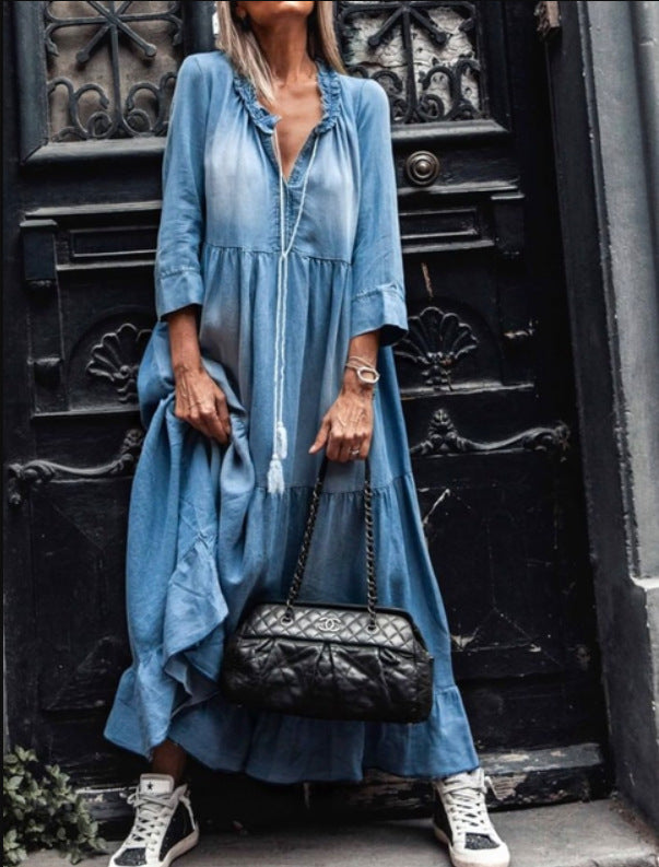 Light blue tiered maxi dress with V-neck, front buttons, three-quarter sleeves