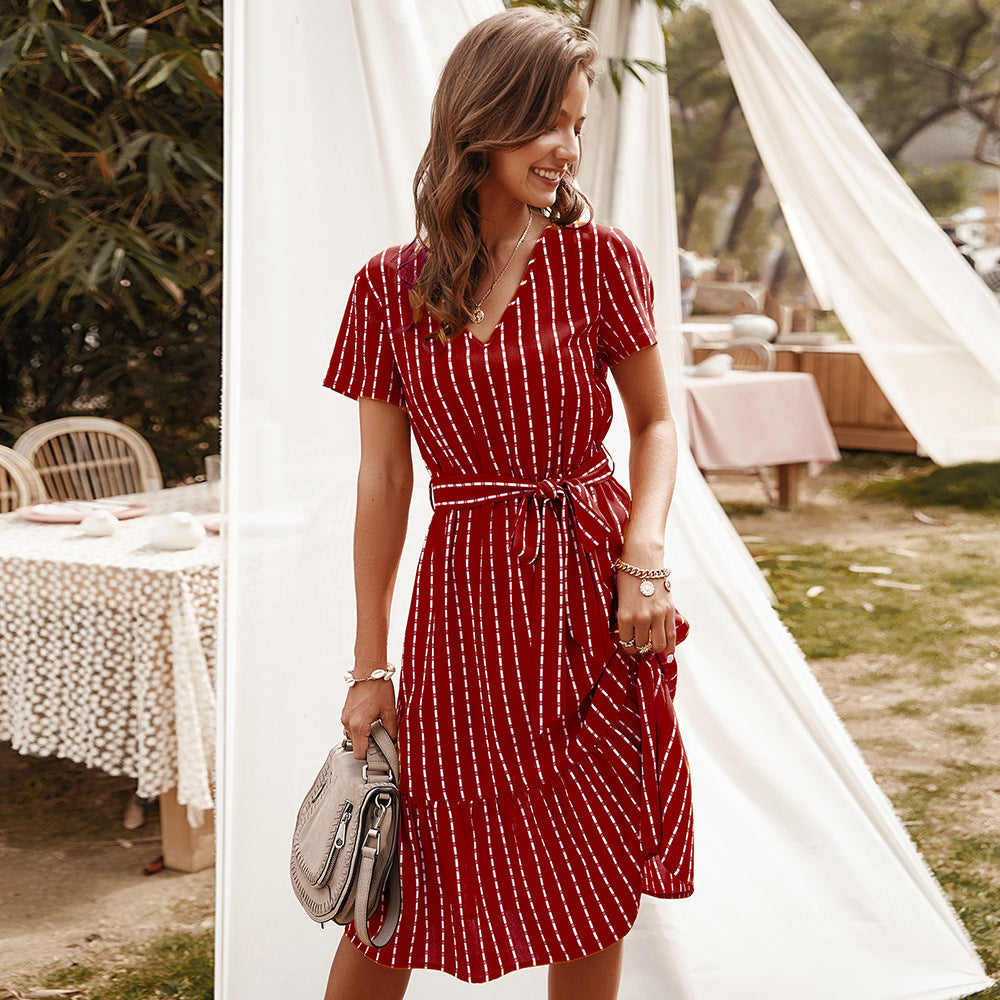 Wine red striped midi dress with V-neck, short sleeves, and waist tie