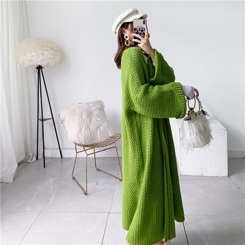 Bright green textured long cardigan with open front and wide sleeves
