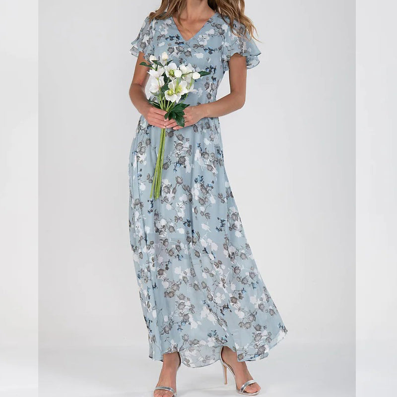 Light blue floral maxi dress with ruffled shoulders and flowing tiered skirt