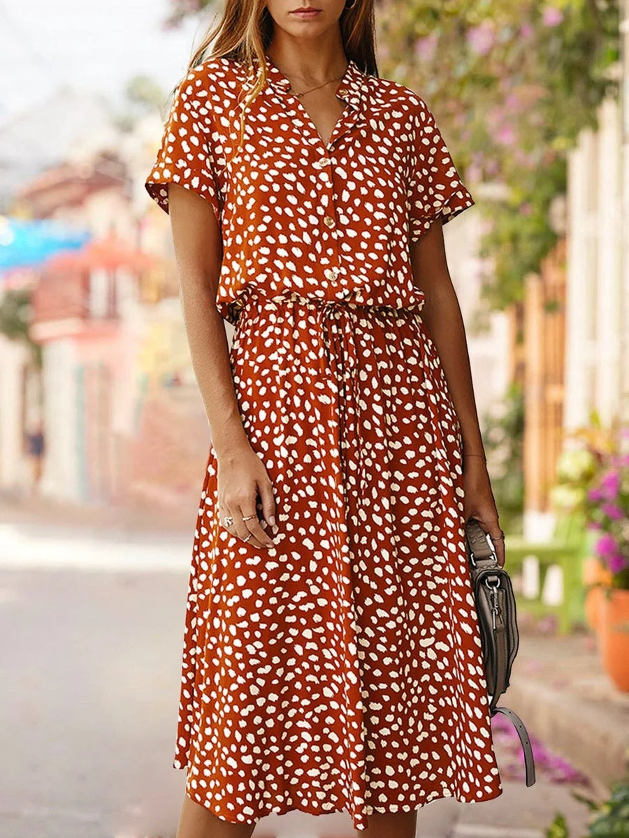 Rust red printed V-neck midi dress with short sleeves and tie belt
