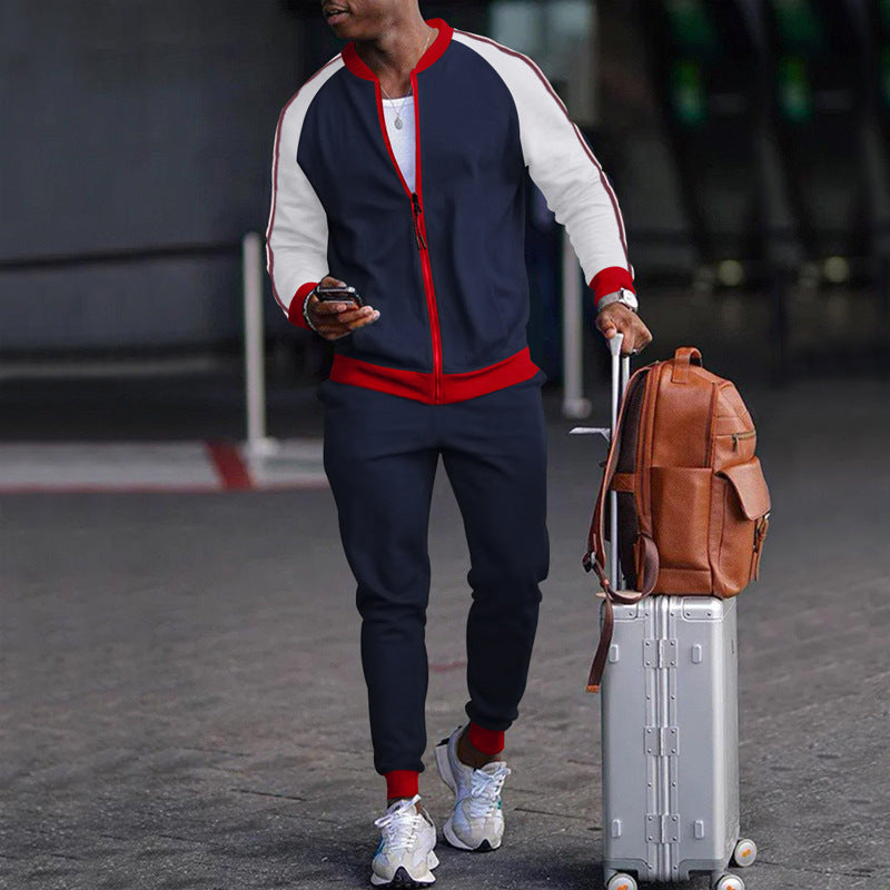 Men's DOLRIX track suit: navy zip jacket with white sleeves and red trim, joggers