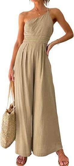 Beige halter-neck wide-leg jumpsuit with smocked bodice and elastic waist