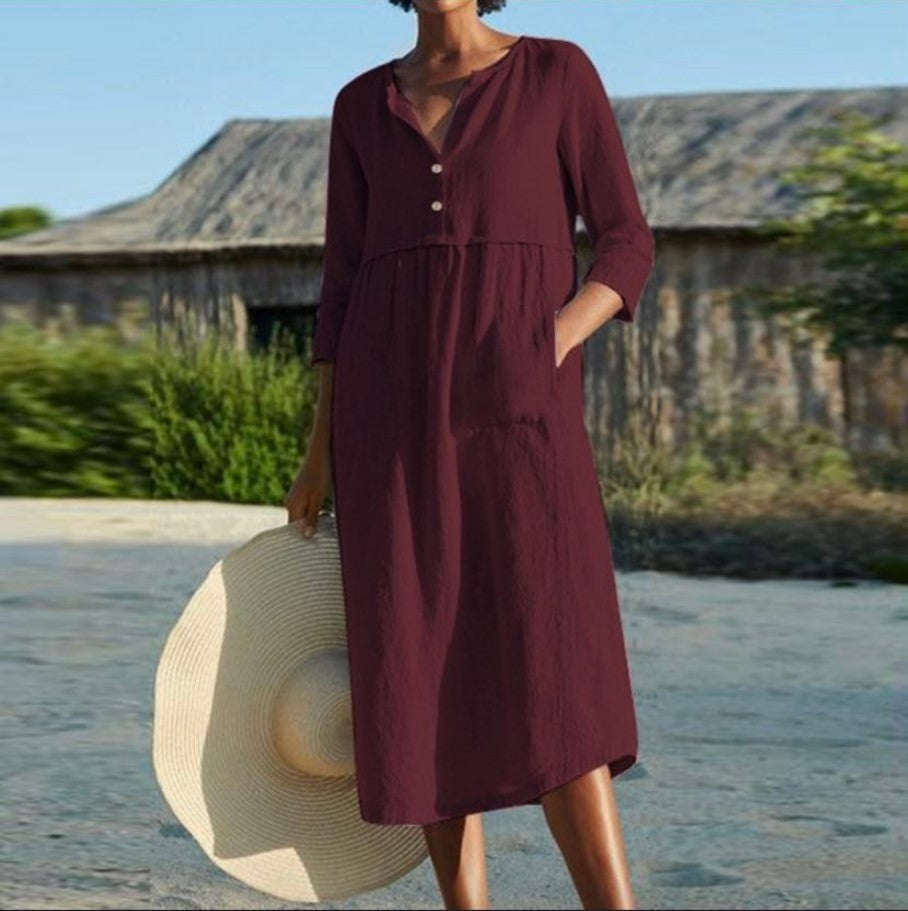 Burgundy button-front summer dress with V-neck and three-quarter sleeves