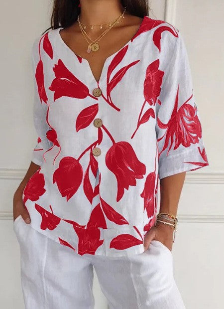 White summer button-up shirt with red floral print, V-neck and 3/4 sleeves