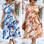 Blue and white abstract print maxi dress with short sleeves and tied waist