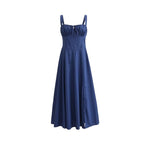 Navy mid-length dress with spaghetti straps and a fitted bodice with flared skirt