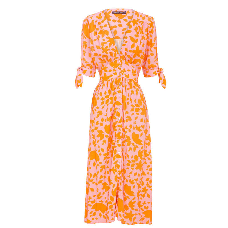 Orange leaf-print midi dress, V-neck button front, quarter sleeves with tie cuffs